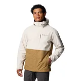 Campera impermeable Columbia modelo Hikebound II Jacket, con diseño en bloques de color beige en la parte superior y marrón claro en la inferior. Cuenta con capucha ajustable, cierre frontal, bolsillos con cremallera y tecnología Omni-Tech.