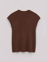 Suéter sin mangas de punto con cuello medio alto y diseño minimalista. Confeccionado en tejido de línea italiana con textura suave.