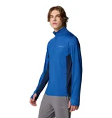 Remera de manga larga Columbia con cierre frontal parcial, cuello alto y orificios para pulgares en los puños. Presenta un diseño técnico con paneles laterales en un tono de azul más oscuro y tecnología Omni-Wick para gestión de la humedad.