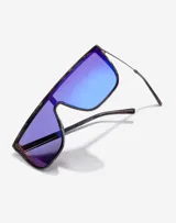 Gafas de sol Hawkers unisex, modelo Weed, con montura carey y lentes espejadas azules.