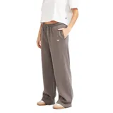 Pantalon tipo jogger de corte ancho, color gris, con cintura elástica y cordón ajustable. Presenta un pequeño logo bordado en la parte frontal.