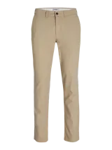 Pantalón chino slim de tiro medio color beige, con cierre de cremallera y bolsillos laterales.