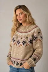 Sweater de lana merino con cuello redondo y diseño con motivos geométricos en tonos azul, marrón, naranja, verde y beige.