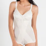 Body modelador blanco con soutien reductor sin aro, confeccionado en tela de faja de alta contención. Reforzado en zona abdominal con bandas interiores frontales, breteles anchos regulables y cavado cerrado. Confeccionado con tela que contiene fibra LYCRA®.