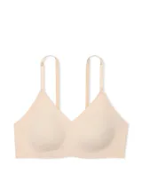 Bralette inalámbrico color beige, con escote en V, acolchado fijo y tirantes ajustables con logo de la marca.