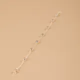 Pulsera de plata 925 con cadena fina y pequeñas bolitas espaciadas.
