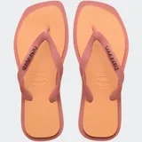 Ojotas Havaianas Top Square Fusion con base naranja y tiras color rosado. El logo de la marca en las tiras es dorado.
