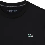 Remera deportiva Lacoste Sport negra de jersey elastizado Ultra Dry, con cuello redondo y logo de cocodrilo bordado en el pecho.