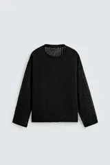 Jersey de punto con estructura abierta y diseño de red, corte relajado, cuello redondo y manga larga.
