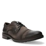 Zapato de vestir tipo derby Democrata modelo Astro, confeccionado en cuero con acabado envejecido, cierre mediante cordones y suela de goma con relieve.