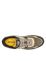 Championes Cat modelo Pause, de diseño retro con paneles en gamuza y lona. Presenta una combinación de colores verde oliva, beige y negro, con suela de goma texturizada y cordones jaspeados.
