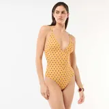 Malla enteriza amarilla con estampado floral, escote en V pronunciado y tirantes finos ajustables.