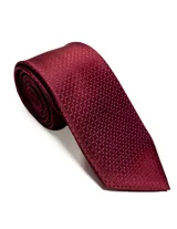 Corbata de seda azul marino con estampado paisley en tonos rosados y blancos.