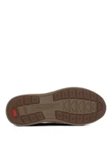 Zapatos slip-on Hush Puppies modelo Hunt II de color marrón, con capellada de cuero, suela ultraliviana y flexible con tecnología Zero G y paneles elásticos laterales para un calce cómodo.