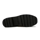 Mocasines de cuero sintético color negro con suela track de plataforma dentada.