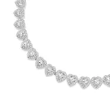 Collar Swarovski con baño de rodio, adornado con cristales blancos en forma de corazón y halo de pavé transparente.