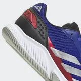 Championes Adidas Courtquick azules con detalles en rojo, blanco y negro. Presentan las tres tiras características de la marca en color plateado.