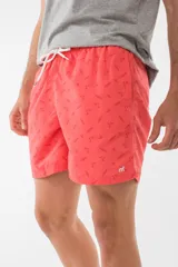 Short de baño azul con estampado de flamencos.