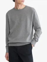 Sweater gris de algodón con cuello redondo, mangas largas con puños acanalados y logo de Calvin Klein bordado en el pecho.