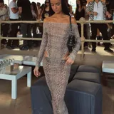 Pollera larga de microtul con estampado animal print en tonos marrones. Tiene cintura elástica.