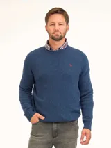 Buzo de punto azul con cuello redondo, mangas largas con puños acanalados y detalle de logo bordado en el pecho.