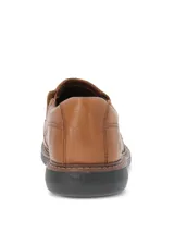 Zapato tipo mocasín de cuero color marrón, con diseño de costuras visibles y suela de goma EVA flexible en color negro.