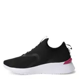 Championes Puma Remedie Slip On negros con detalles fucsia y suela blanca. Diseño slip-on con capellada de malla y ajuste elástico.