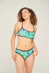 Bombacha vedetina estampada con hojas en tonos azules y contorno celeste.