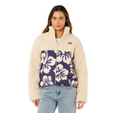 Campera tipo puffer de Rip Curl, con diseño combinado de corderito color beige en la parte superior y mangas, y panel frontal acolchado en color azul marino con estampado floral. Cuenta con cierre frontal completo y cuello alto.