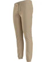 Pantalón de jogging color beige, corte slim, con cintura elástica ajustable con cordón, bolsillos laterales y logo de Tommy Jeans bordado en la parte trasera.