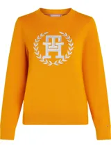 Sweater de punto color naranja con cuello redondo, manga larga y corte regular. Presenta el monograma TH bordado en el pecho en tono blanco con diseño de laureles.