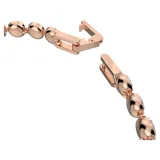Pulsera rígida con eslabones de metal con baño de oro rosa y cristales transparentes decorados con pavé.