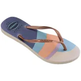 Ojotas Havaianas Slim Palette Glow con base estampada con franjas de colores pastel y tiras finas color cobre.