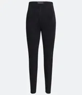 Pantalón tipo legging de tiro alto confeccionado en material sintético con recortes verticales y cierre lateral con cremallera.