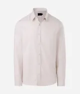 Camisa de manga larga con cuello inglés y cierre frontal de botones, confeccionada en tricolina de algodón color beige.