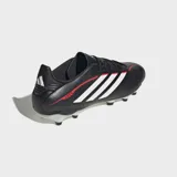 Championes de fútbol Adidas Copa Pure IV League para terreno firme. Diseño en color negro con las icónicas tres tiras blancas laterales y detalles en rojo. Presentan tecnología FUSIONFEEL para mayor comodidad y tracción optimizada.