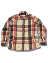 Camisa leñadora a cuadros color beige, marrón, naranja y azul.