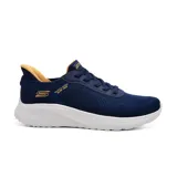Championes deportivos Skechers Hands Free Slip-ins Bobs Sport Squad Chaos - Solid Step, color azul marino con detalles en amarillo. Capellada de tejido técnico con cordones elásticos, plantilla acolchada Skechers Memory Foam y suela de tracción flexible.