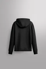 Sudadera de hombre Zara Athleticz de ajuste relajado (relaxed fit), color marrón, confeccionada en tejido técnico compacto con mezcla de algodón y elasticidad. Cuenta con cuello con capucha ajustable con cordones negros, manga larga, bolsillo frontal tipo canguro con un pequeño bolsillo termofijado con cierre, y acabados con rib en puños y cintura.