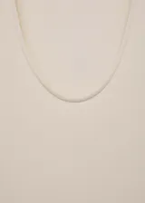 Vestido midi de diseño combinado con cuerpo de algodón acanalado y falda evasé de algodón liso. Presenta cuello escotado, tirantes anchos y cintura fruncida.