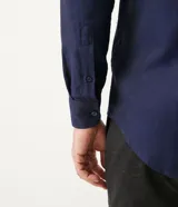 Camisa de vestir Preston Field modelo classic, de manga larga y diseño liso. Cuenta con cuello camisero y cierre frontal con botones al tono.