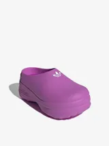 Zuecos Adidas Adifom Stan Mule color lila con plataforma y logo de la marca en relieve en el talón.