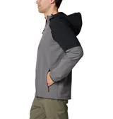 Campera softshell con capucha, de diseño bicolor en gris y negro. Cuenta con cierre frontal completo, bolsillo vertical en el pecho con cierre y bolsillos laterales. Presenta logo de la marca estampado en el pecho y puños elásticos.