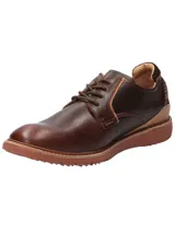 Zapato casual de cuero lustrado color marrón, con cordones y suela de EVA con tecnología Honey Foam para mayor amortiguación y flexibilidad.