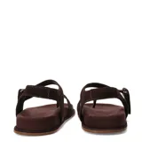 Sandalias de cuero marrón, diseño plano con tiras separadoras de dedos y tira ajustable en el talón.
