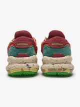 Championes Satorisan modelo Chacrona Linen, de color verde con detalles en beige, naranja y salmón, confeccionados en lino y cuero, con suela chunky moteada y cordones bicolor.