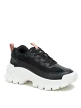 Championes Cat modelo Intruder Lite, de diseño robusto con plataforma. Presenta una combinación de cuero sintético y gamuza en color negro, con suela gruesa de goma blanca y detalles en color rosado en las tiras de ajuste.