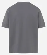 Remera oversize de algodón color gris, con cuello redondo, manga corta y sisa desplazada, de la marca Blue Steel.