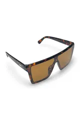 Lentes de sol con armazón carey y lentes marrones de diseño geométrico grande.