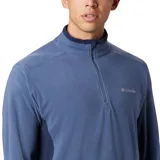 Buzo polar de media cremallera Columbia, confeccionado en tejido suave con tecnología de protección solar Omni-Shade UPF 50. Presenta cuello alto, mangas largas y logo de la marca bordado en el pecho.